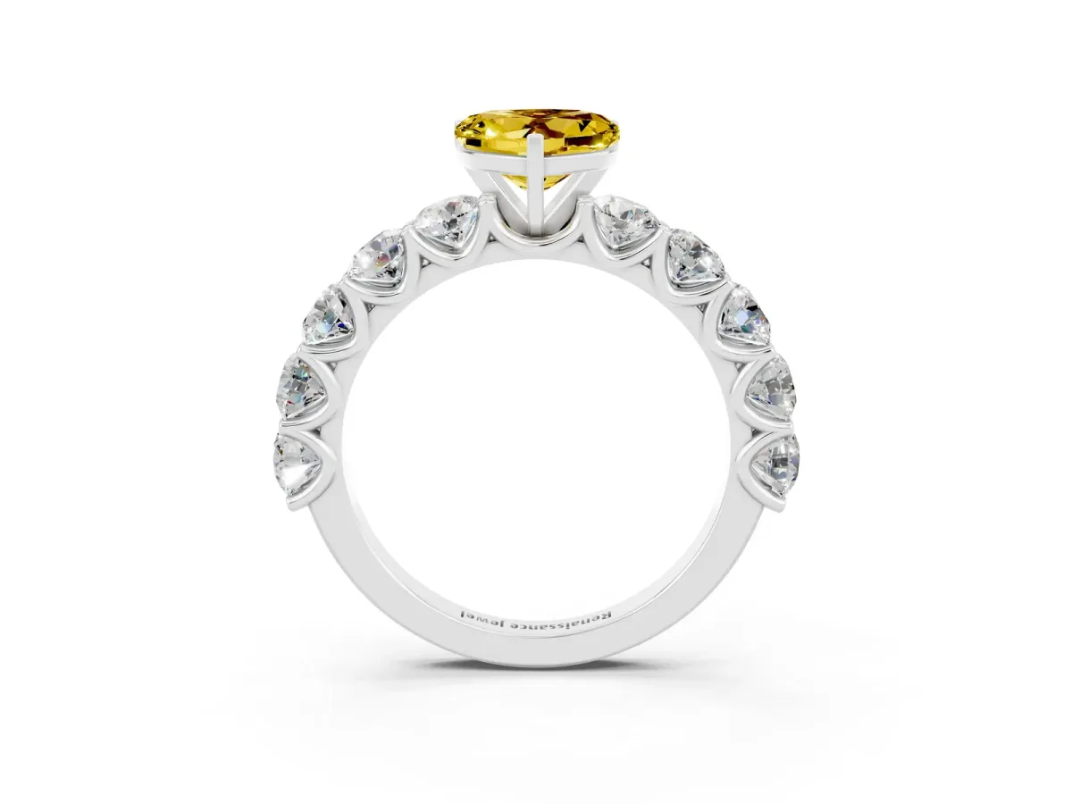 Heart Cut Yellow Sapphire Prong Setting with Side Stones on a Pave Band Silver