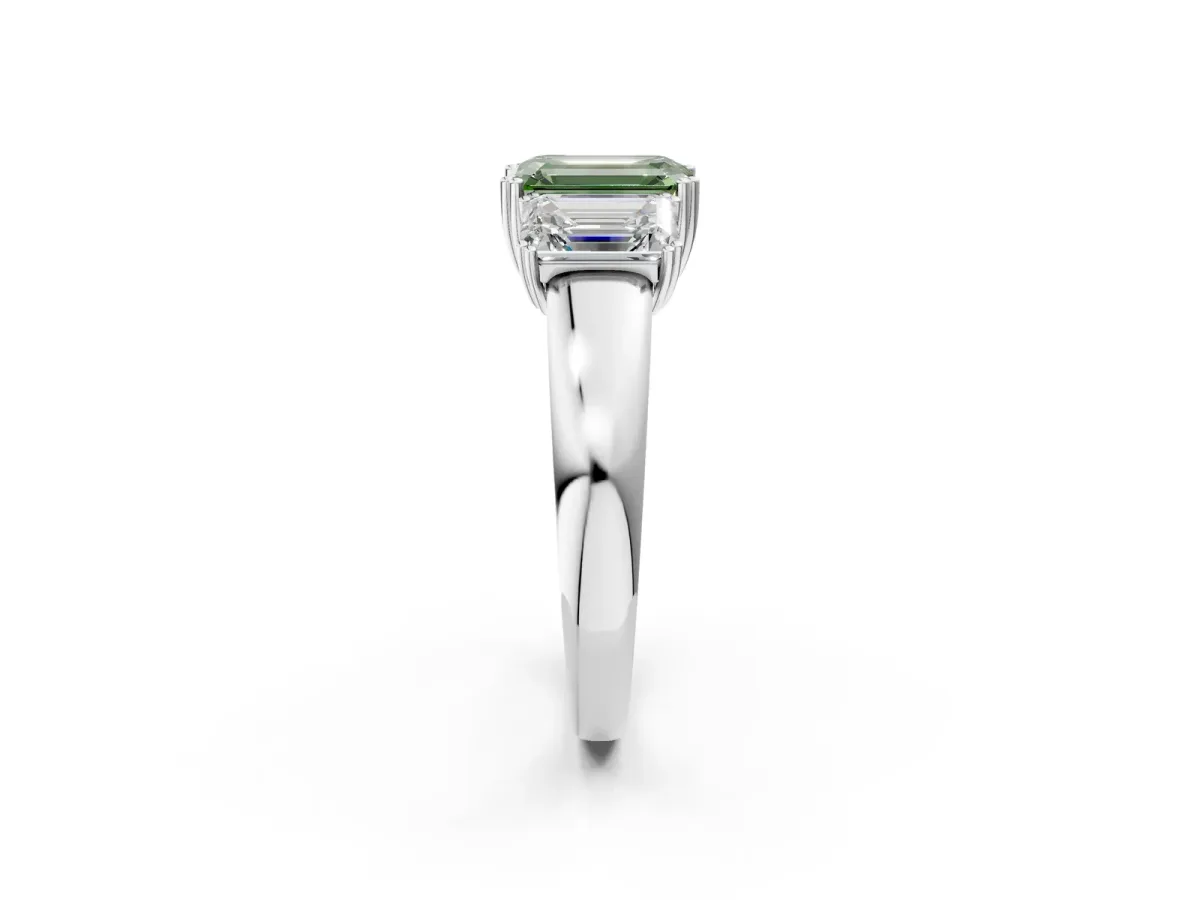 Fancy Green Three-Stone Emerald Cut Cut Diamond Ring with Channel Set Band and Four-Prong Setting Platinum