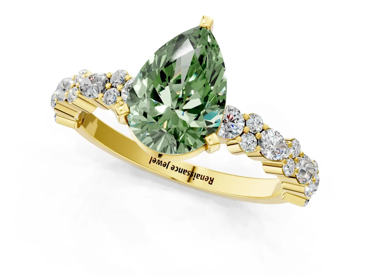 Fancy Green Pear Cut Diamond Side Stone Solitaire Ring with Round and Four-Prong Setting Yellow gold