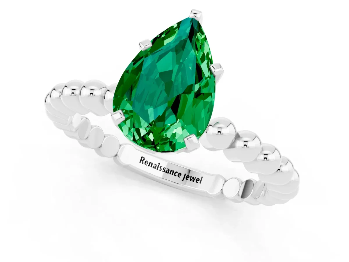 Pear Cut Emerald Solitaire Ring with Beaded Band and Prong Setting Platinum