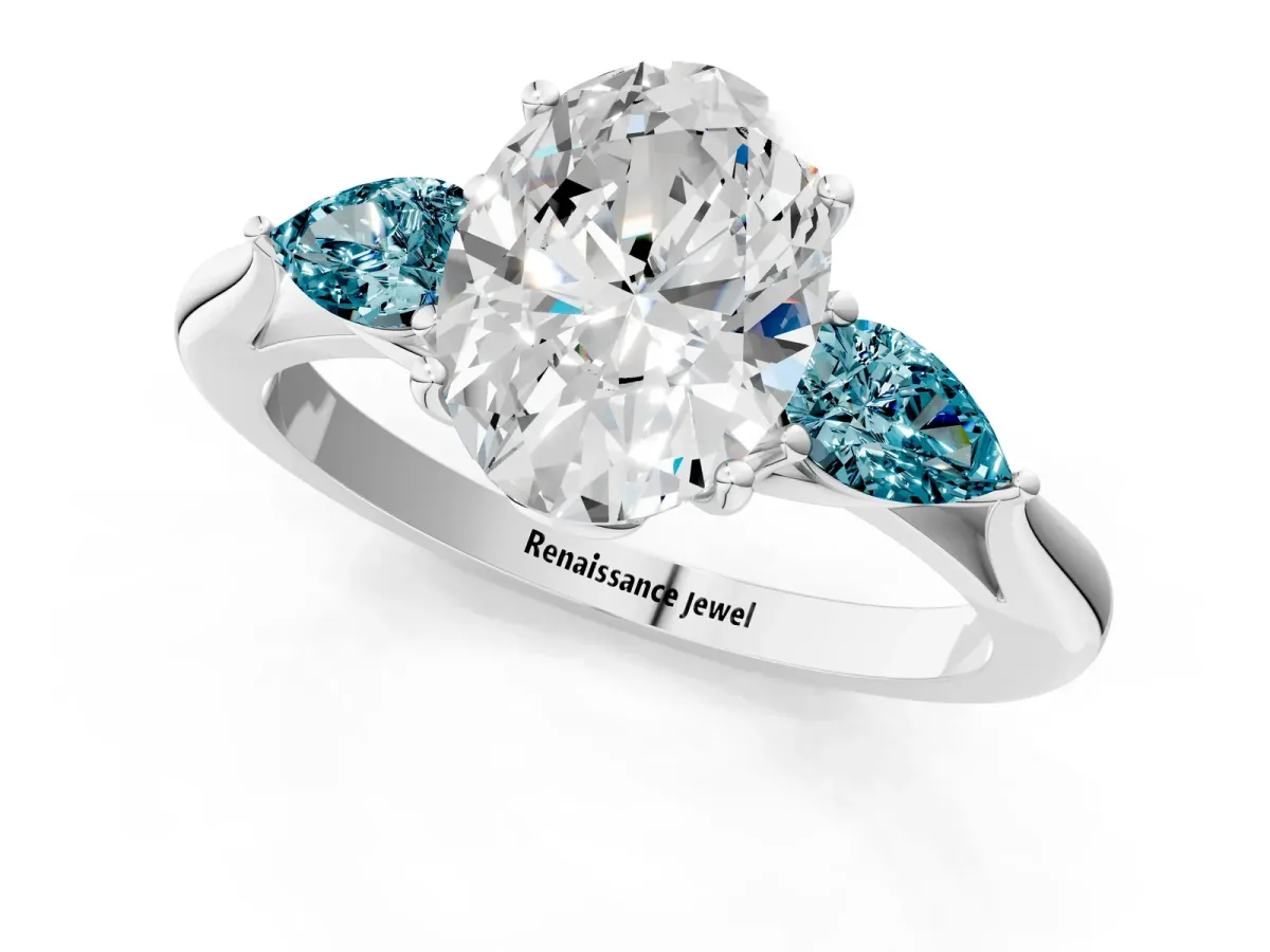 Oval Cut Diamond Three-Stone Ring with Pear Blue Topaz Side Stones and Prong Setting Silver