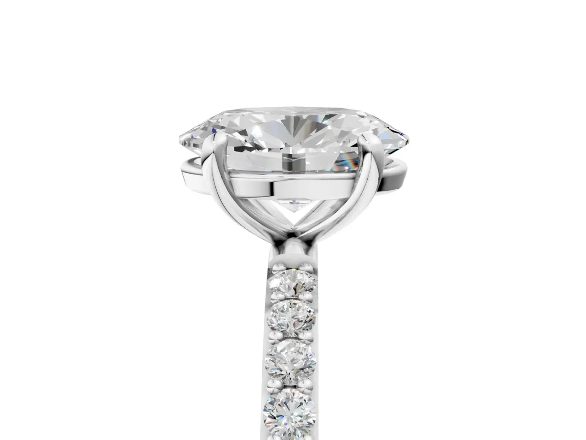 Oval Cut Diamond Solitaire Ring with Round Pavé Band and Prong Setting Platinum
