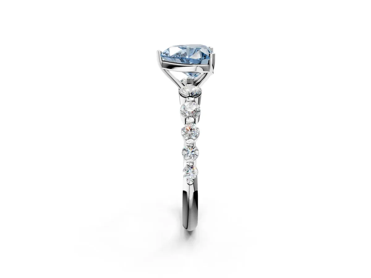 Fancy Blue Heart Cut Solitaire Diamond Ring with Pave Band and Four-Prong Setting Silver
