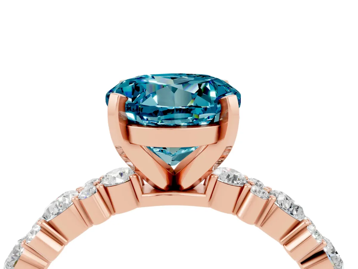 Round Cut Blue Topaz Side Stone Solitaire Ring with Round and Four-Prong Setting Rose gold