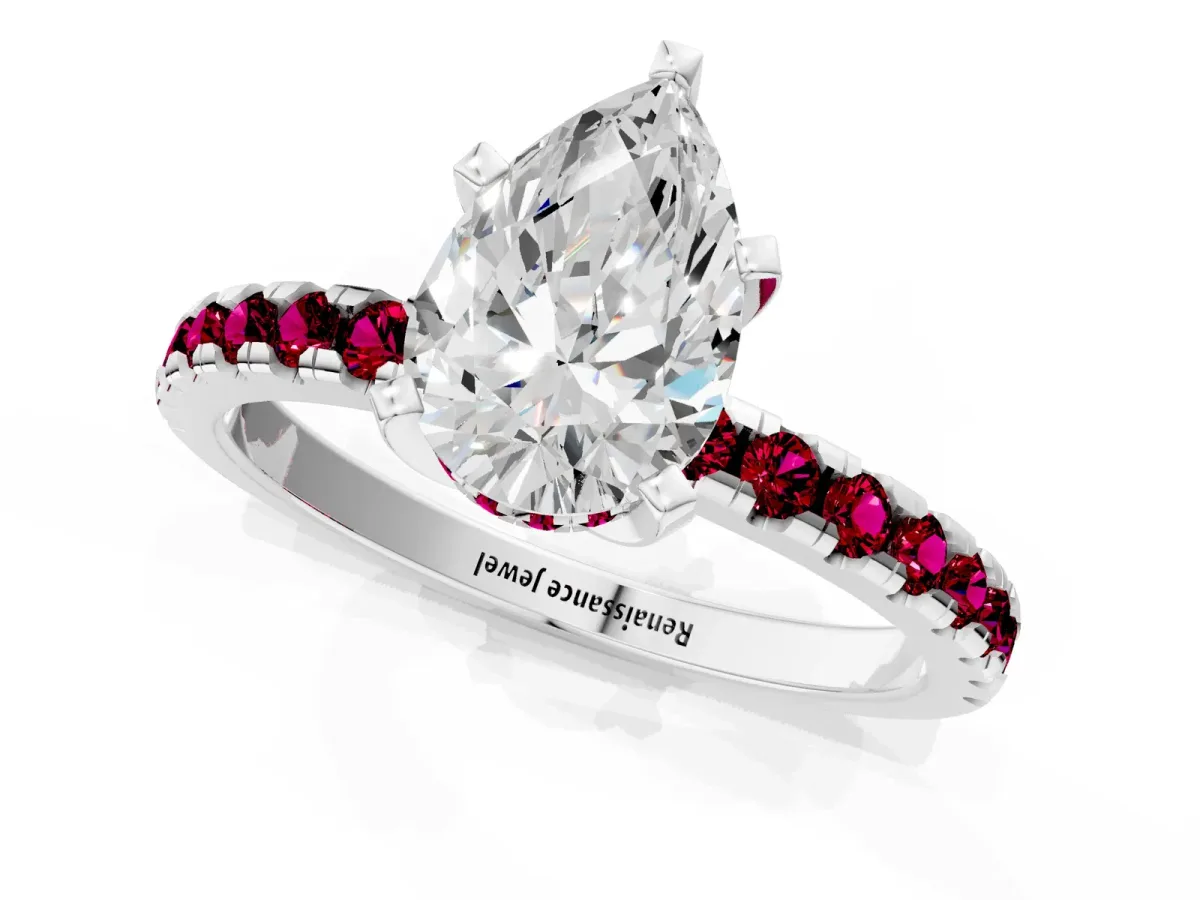 Pear Cut Diamond Solitaire Ring with Round Garnet Pavé Band and Four-Prong Setting Silver
