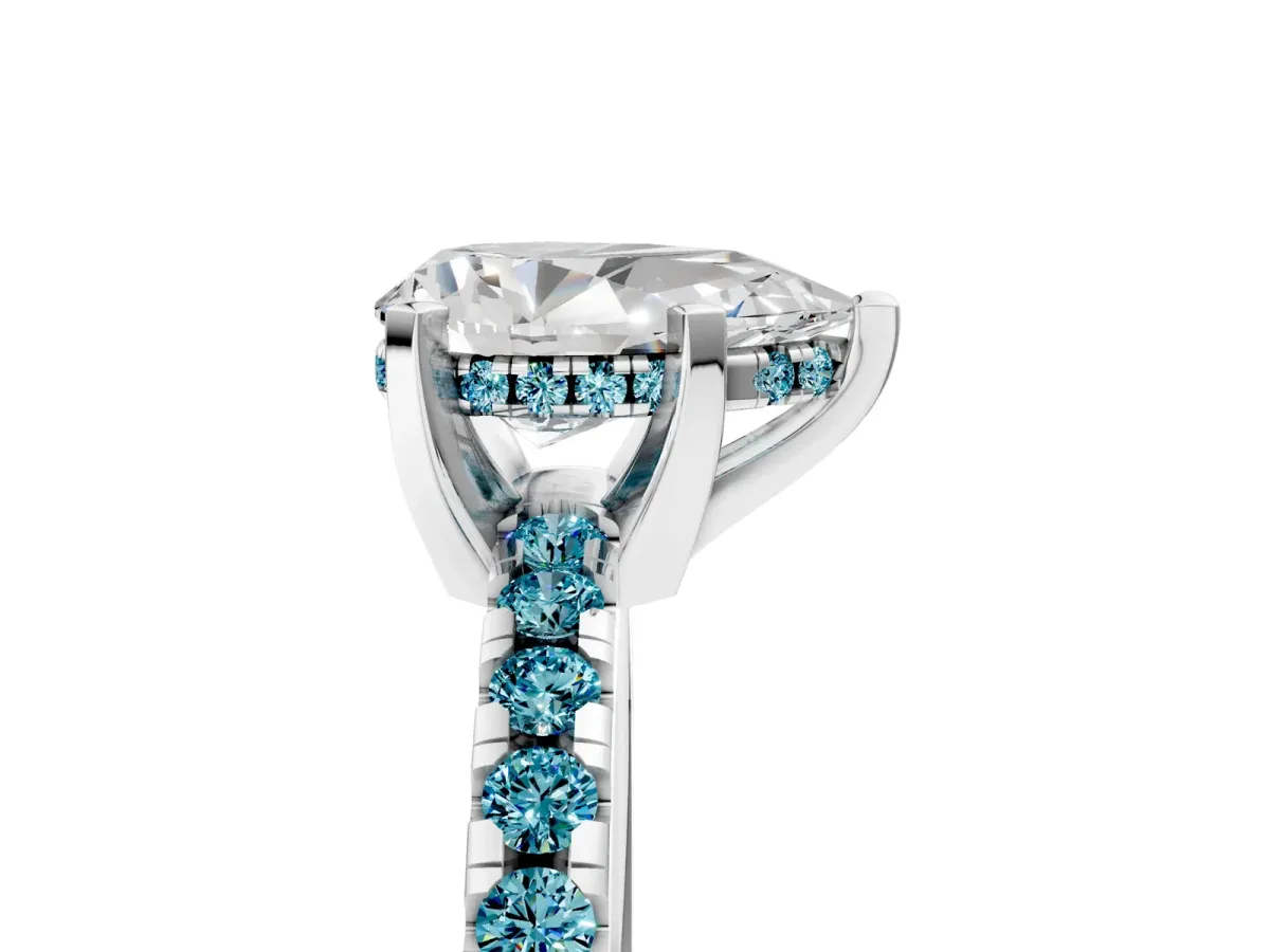 Pear Cut Diamond Solitaire Ring with Round Blue Topaz Pavé Band and Four-Prong Setting Silver