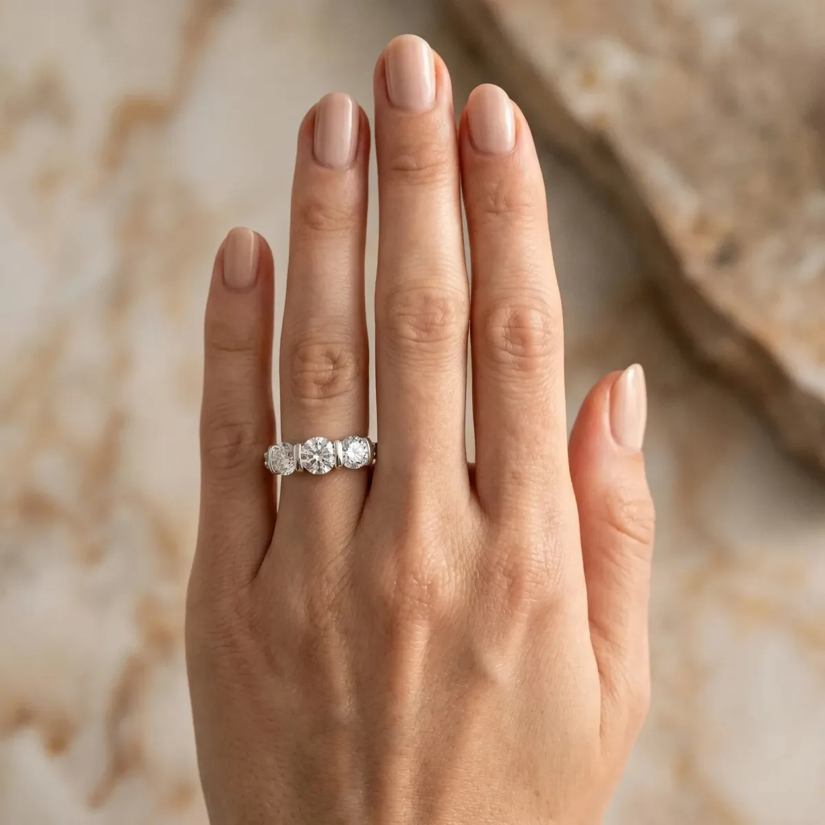 Round Cut Brilliant Trilogy Channel Set Diamond Ring with Bar Prongs Platinum