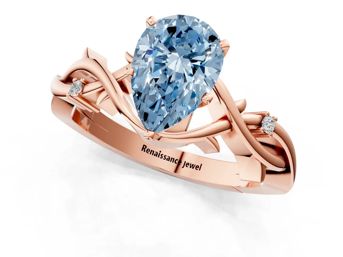 Fancy Blue Pear Cut Diamond Solitaire Ring with Twisted Band and Prong Setting Rose gold
