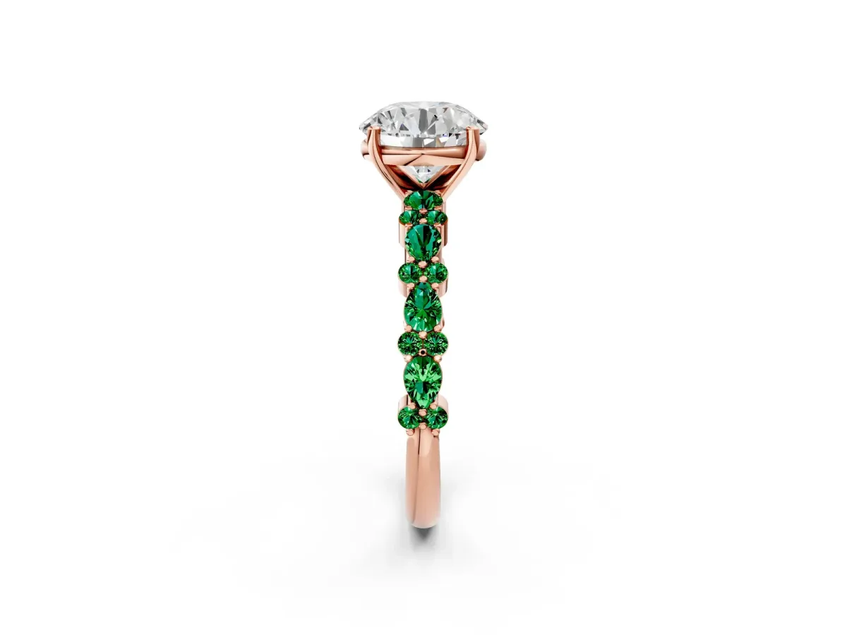 Round Cut Diamond Side Stone Solitaire Ring with Round Emerald and Four-Prong Setting Rose gold