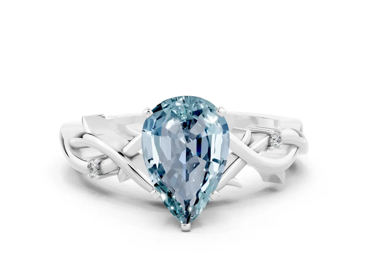 Pear Cut Aquamarine Solitaire Ring with Twisted Band and Prong Setting Platinum
