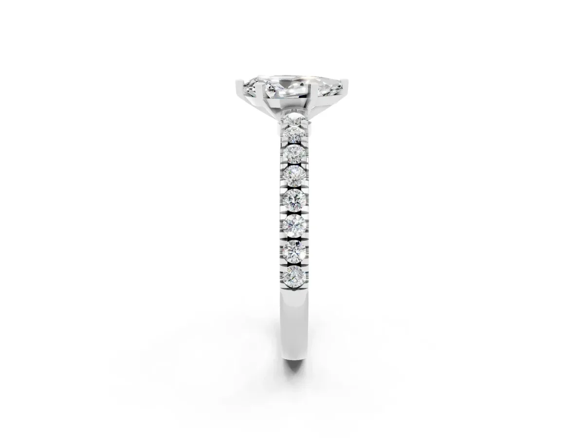 Pear Cut Solitaire Moissanite with Pavé Band and Four-Prong Setting Silver