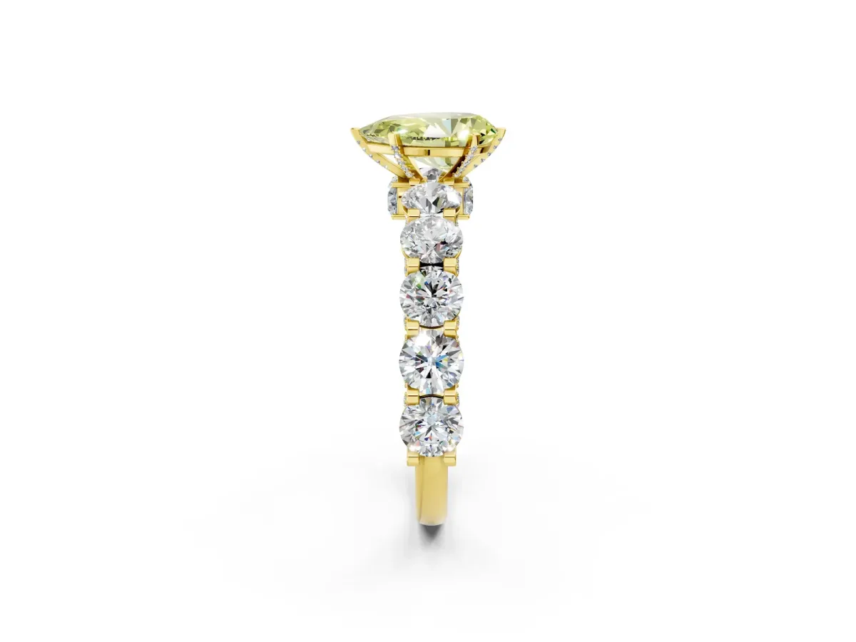 Fancy Yellow Pear Cut Diamond Side Stone Engagement Ring with Four-Prong Setting Yellow gold