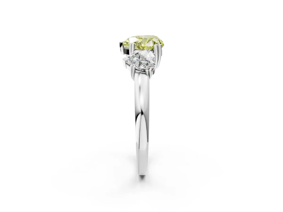 Fancy Yellow Three-Stone Heart Cut Cut Diamond Ring with Channel Set Band and Four-Prong Setting Silver
