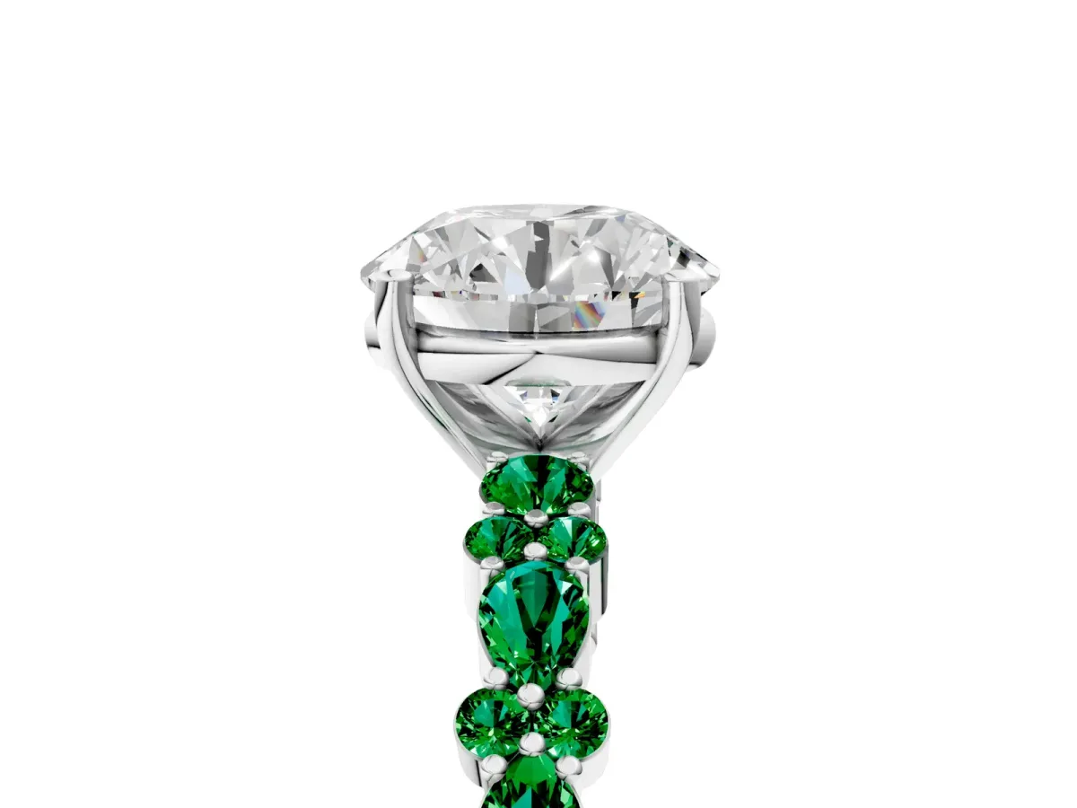 Round Cut Diamond Side Stone Solitaire Ring with Round Emerald and Four-Prong Setting White gold