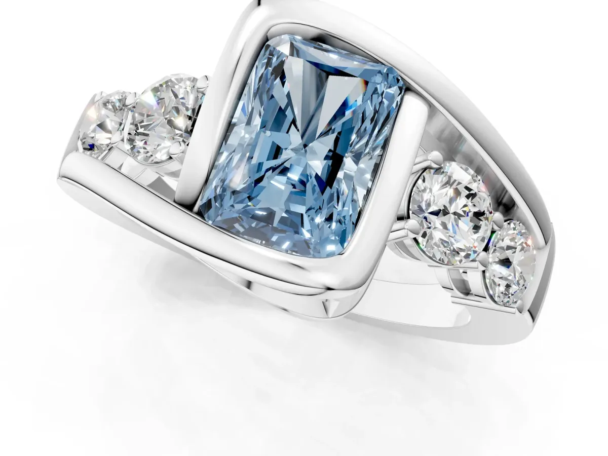 Fancy Blue Bezel Set Radiant Cut Diamond Bypass Ring with Round Accents Silver