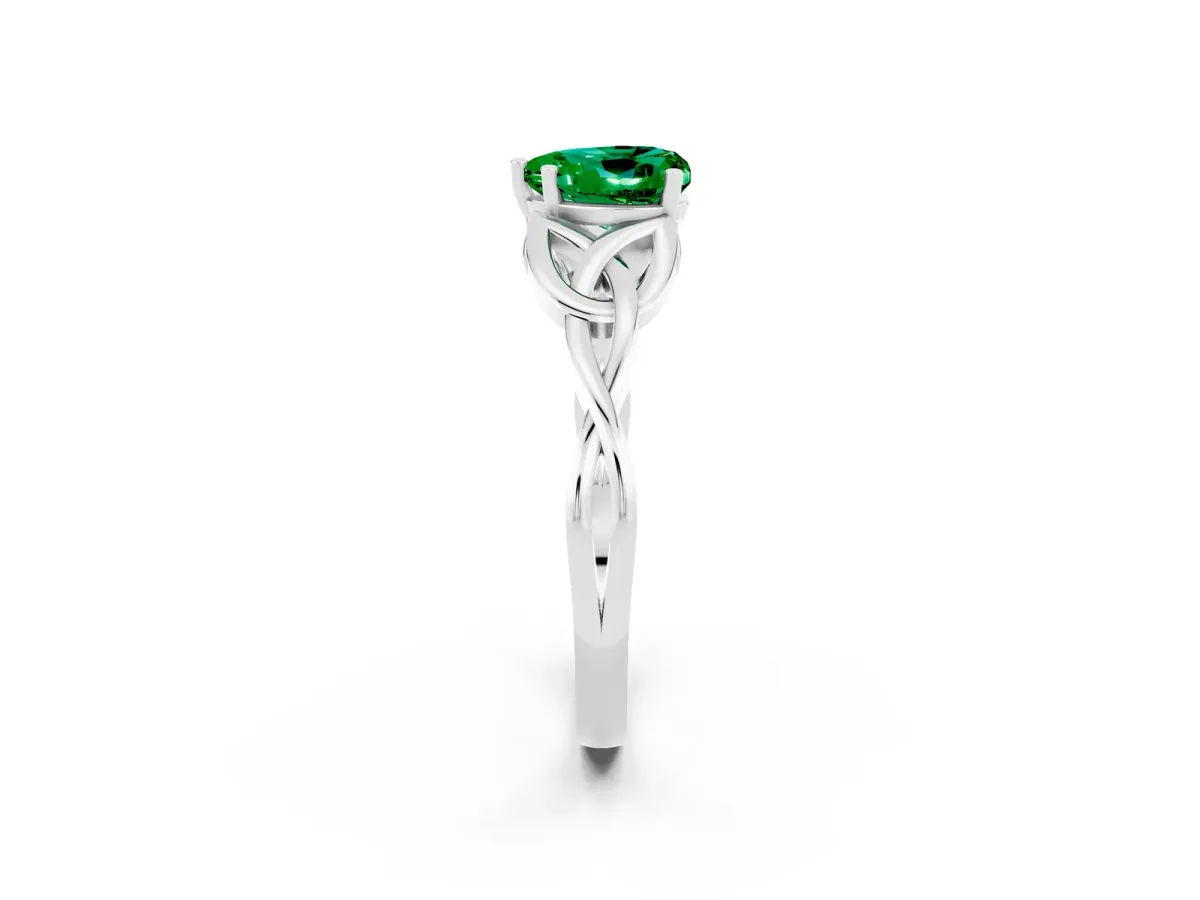 Heart Cut Emerald Solitaire Engagement Ring with Celtic Knot Band and Four-Prong Setting Silver