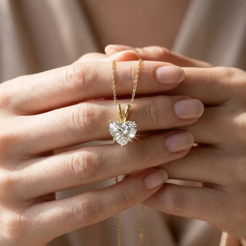 Heart-Shaped Diamond Solitaire Pendant with Four-Prong Setting Yellow gold