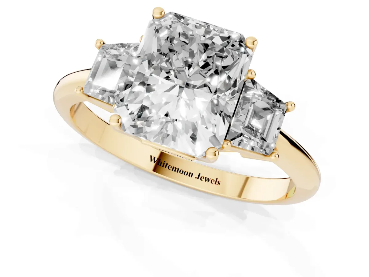 Radiant Cut Diamond Three-Stone Ring with Trapezoid Side Stones and Prong Setting Yellow gold
