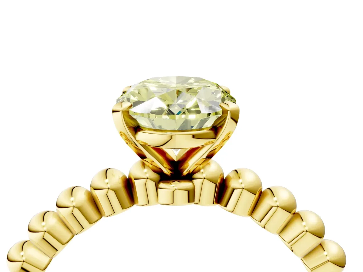 Fancy Yellow Oval Cut Diamond Solitaire Ring with Beaded Band and Prong Setting Yellow gold
