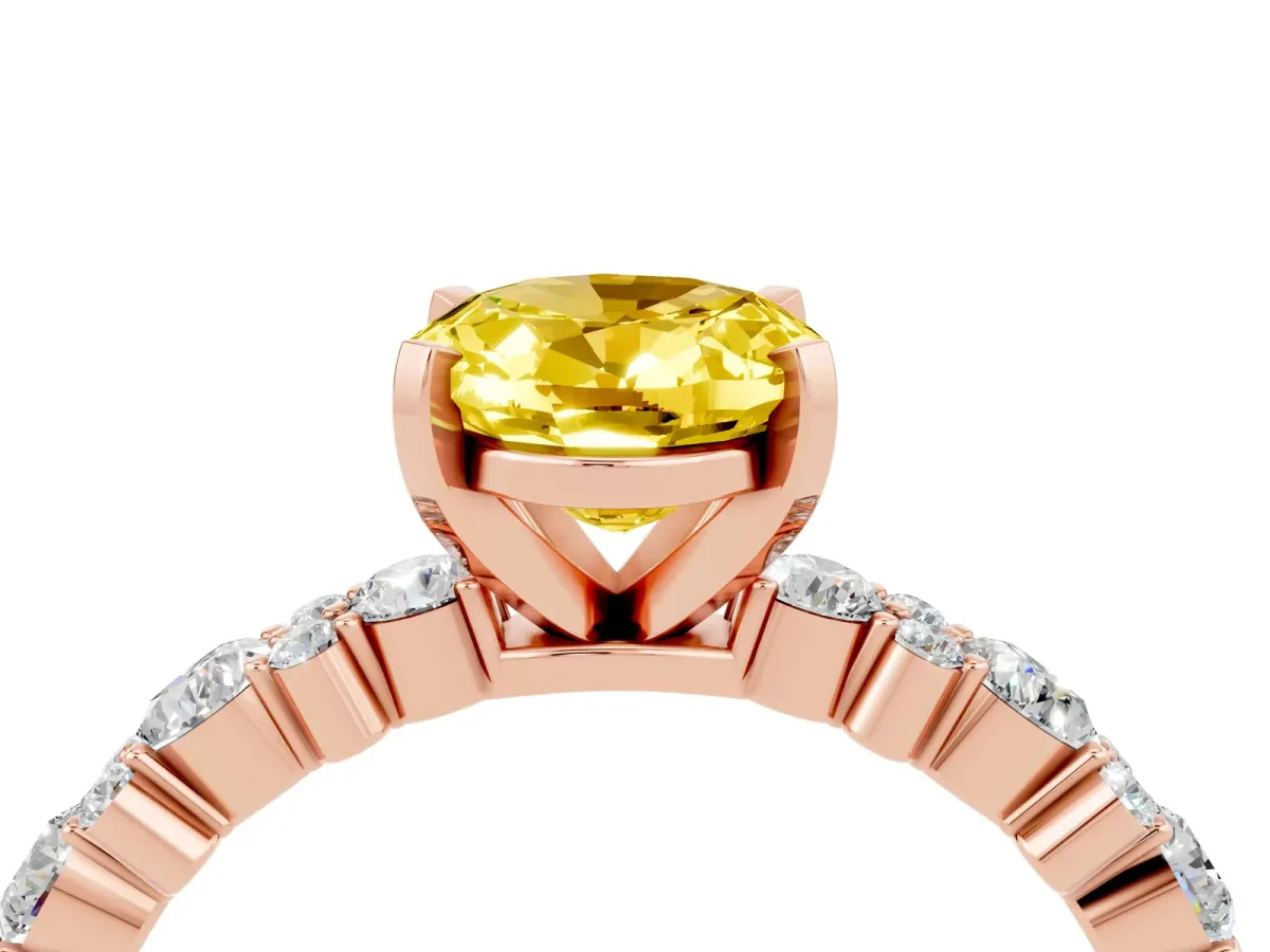 Oval Cut Yellow Sapphire Side Stone Solitaire Ring with Round and Four-Prong Setting Rose gold