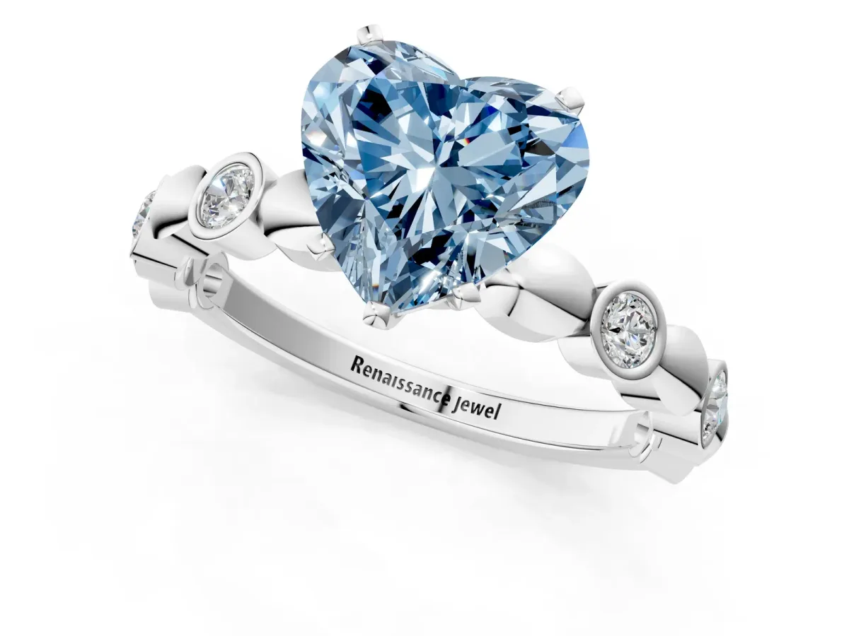 Fancy Blue Heart Cut Solitaire Bezel-Set Diamond Ring with Beaded Band and Four-Prong Setting Silver