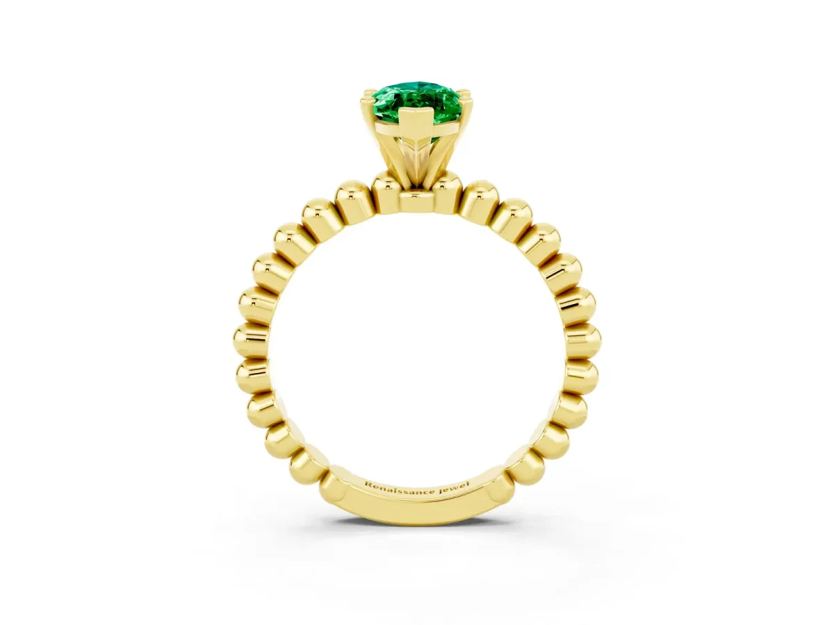Marquise Cut Emerald Solitaire Ring with Beaded Band and Prong Setting Yellow gold