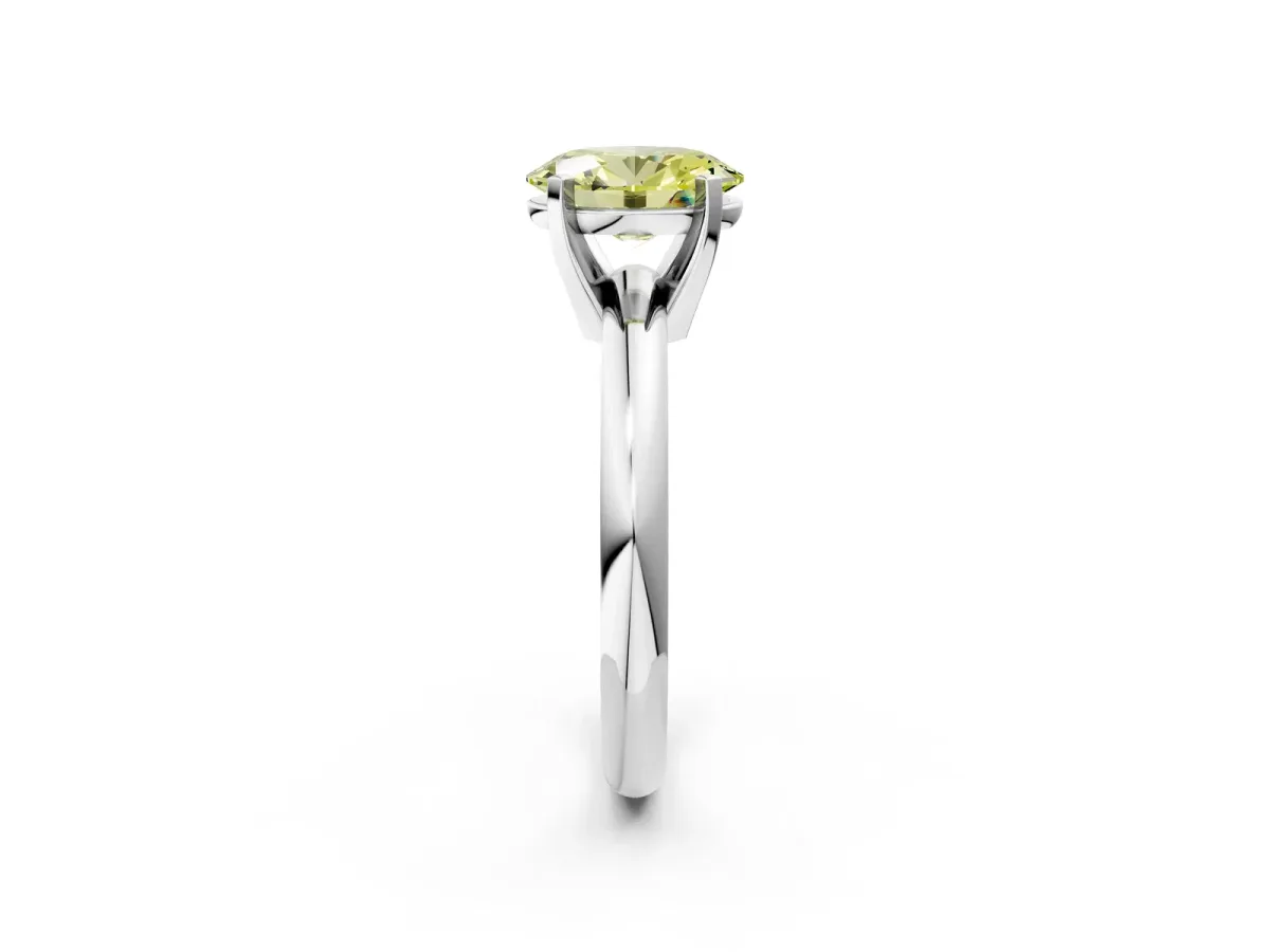 Fancy Yellow Oval Cut Diamond Solitaire Engagement Ring with Round Band and Four-Prong Setting Silver