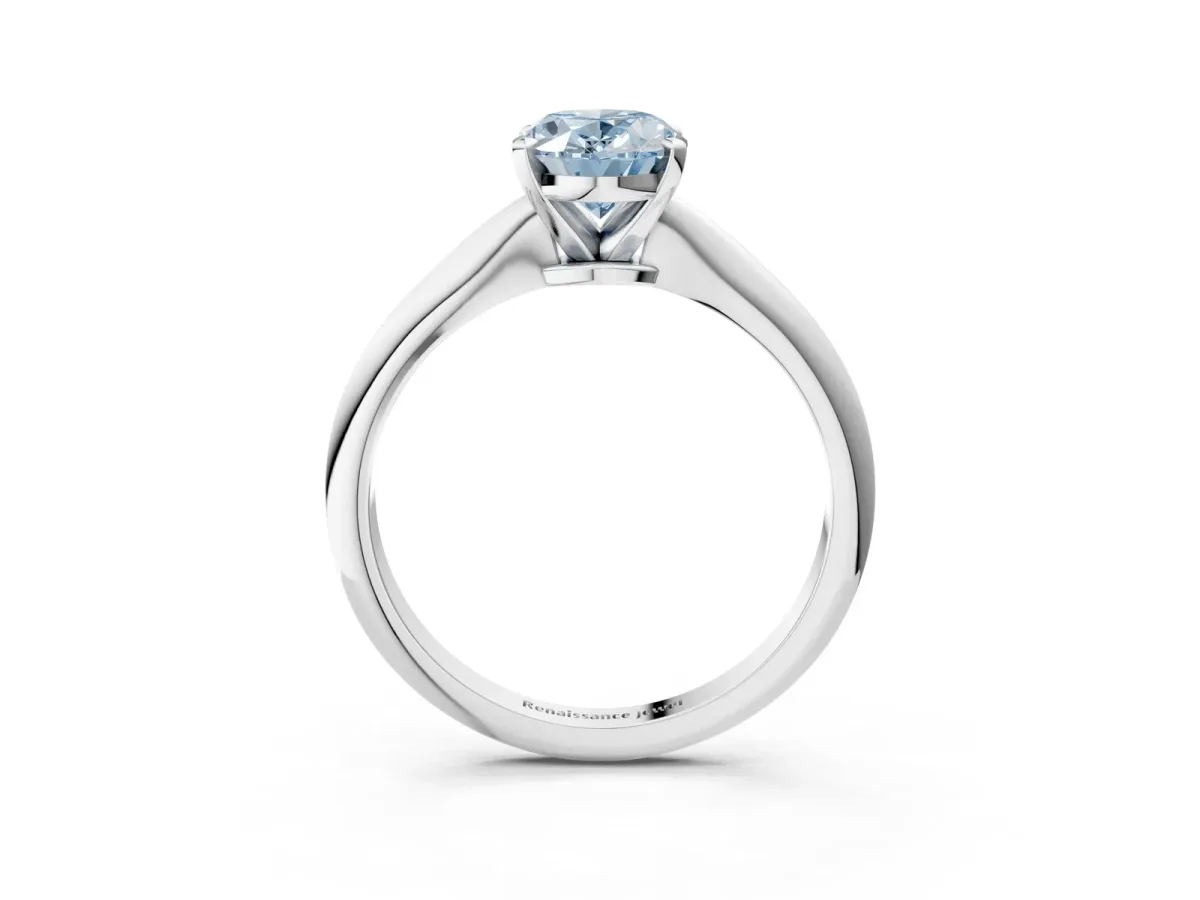 Fancy Blue Oval Cut Diamond Solitaire Engagement Ring with Classic Band and Four-Prong Setting Silver