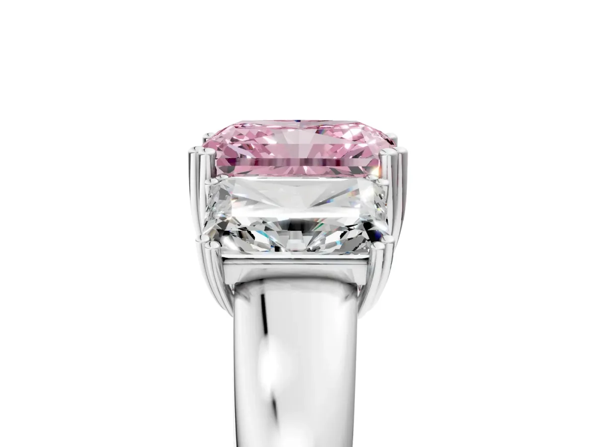 Fancy Pink Three-Stone Radiant Cut Cut Diamond Ring with Channel Set Band and Four-Prong Setting Silver