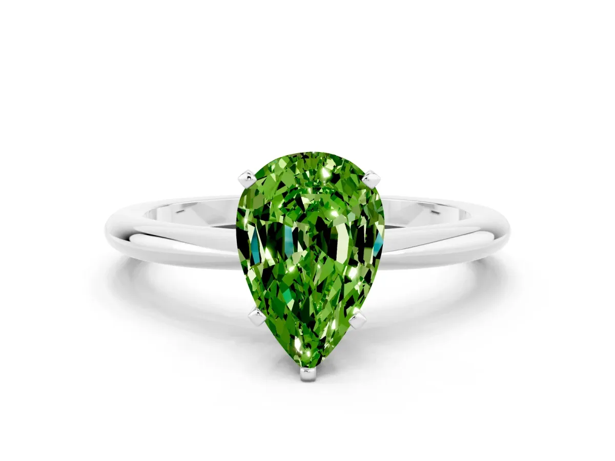 Pear Cut Peridot Solitaire Ring with Six-Prong Setting and Classic Band Silver
