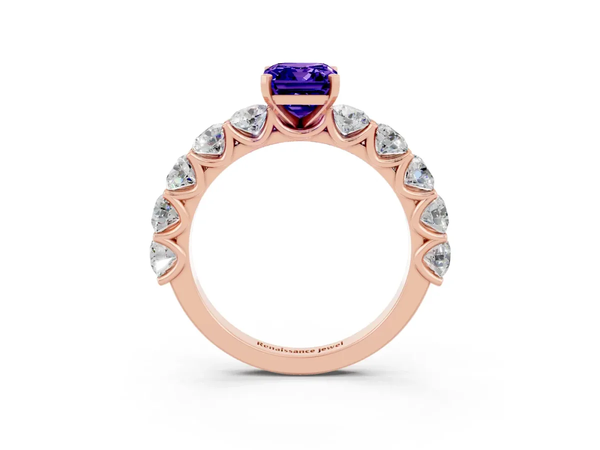 Emerald Cut Tanzanite Prong Setting with Side Stones on a Pave Band Rose gold