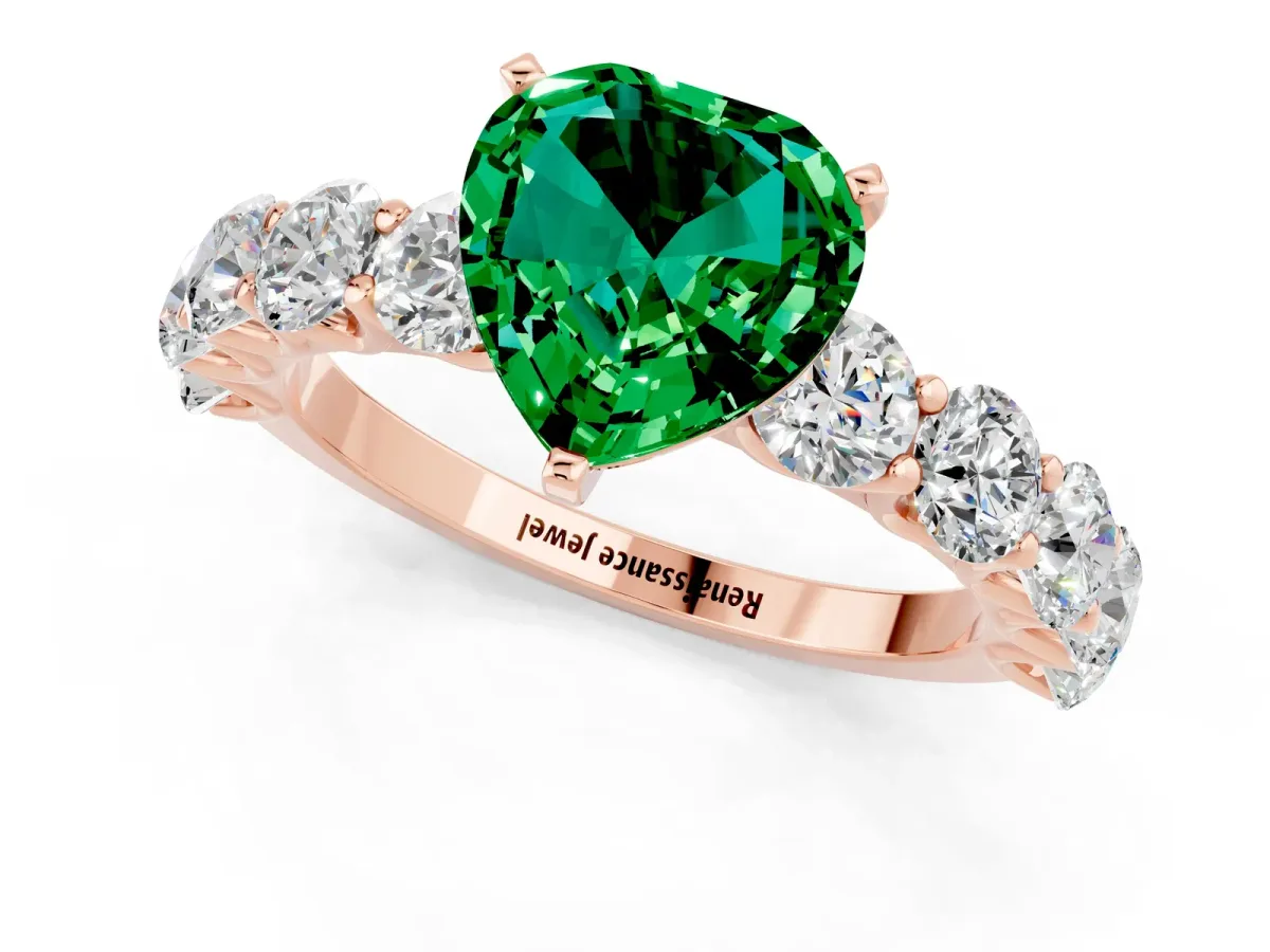 Heart Cut Emerald Prong Setting with Side Stones on a Pave Band Rose gold