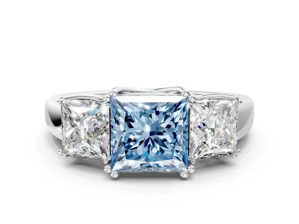 Fancy Blue Three-Stone Princess Cut Cut Diamond Ring with Channel Set Band and Four-Prong Setting Silver
