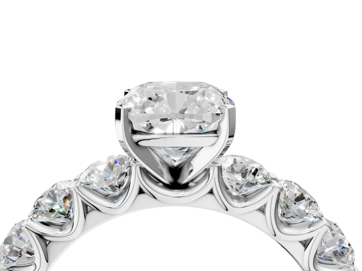 Cushion Cut Diamond Prong Setting with Side Stones on a Pave Band White gold