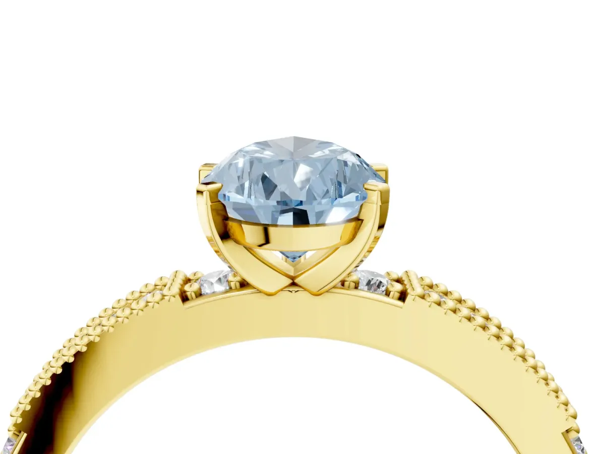 Fancy Blue Pear Cut Solitaire with Pavé Band and Four-Prong Setting Yellow gold