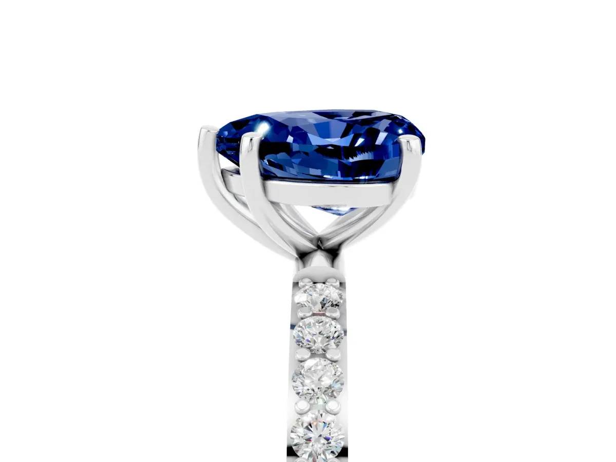 Heart Cut Blue Sapphire Solitaire Ring with Round Pavé Band and Prong Setting Silver