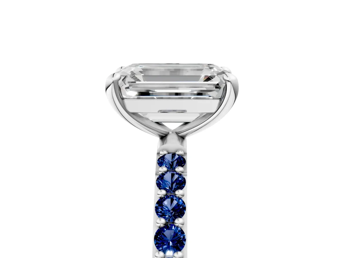 Emerald Cut Diamond Solitaire Ring with Round Blue Sapphire Pavé Band and Prong Setting Silver