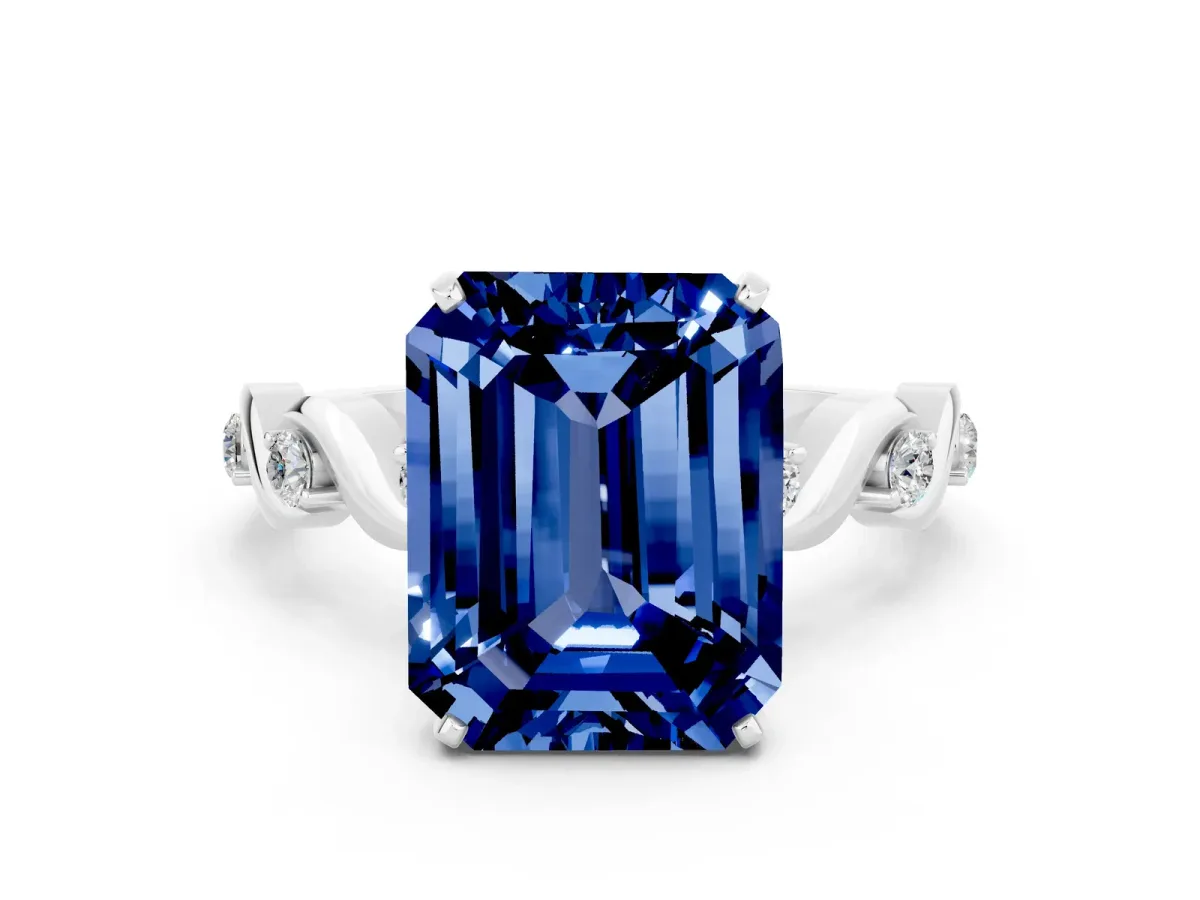 Emerald Cut Blue Sapphire Solitaire Twisted Band with Round Accents and Prong Setting Silver
