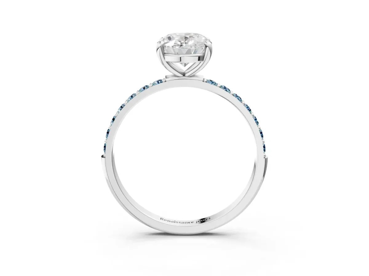 Oval Cut Diamond Solitaire Ring with Round Aquamarine Pavé Band and Prong Setting Silver