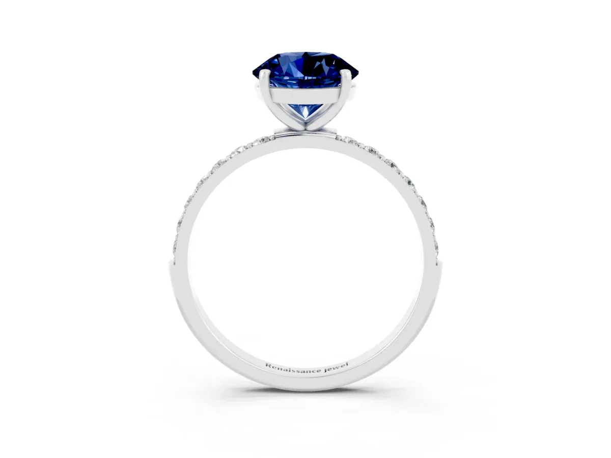 Round Cut Blue Sapphire Solitaire Ring with Round Pavé Band and Prong Setting Silver