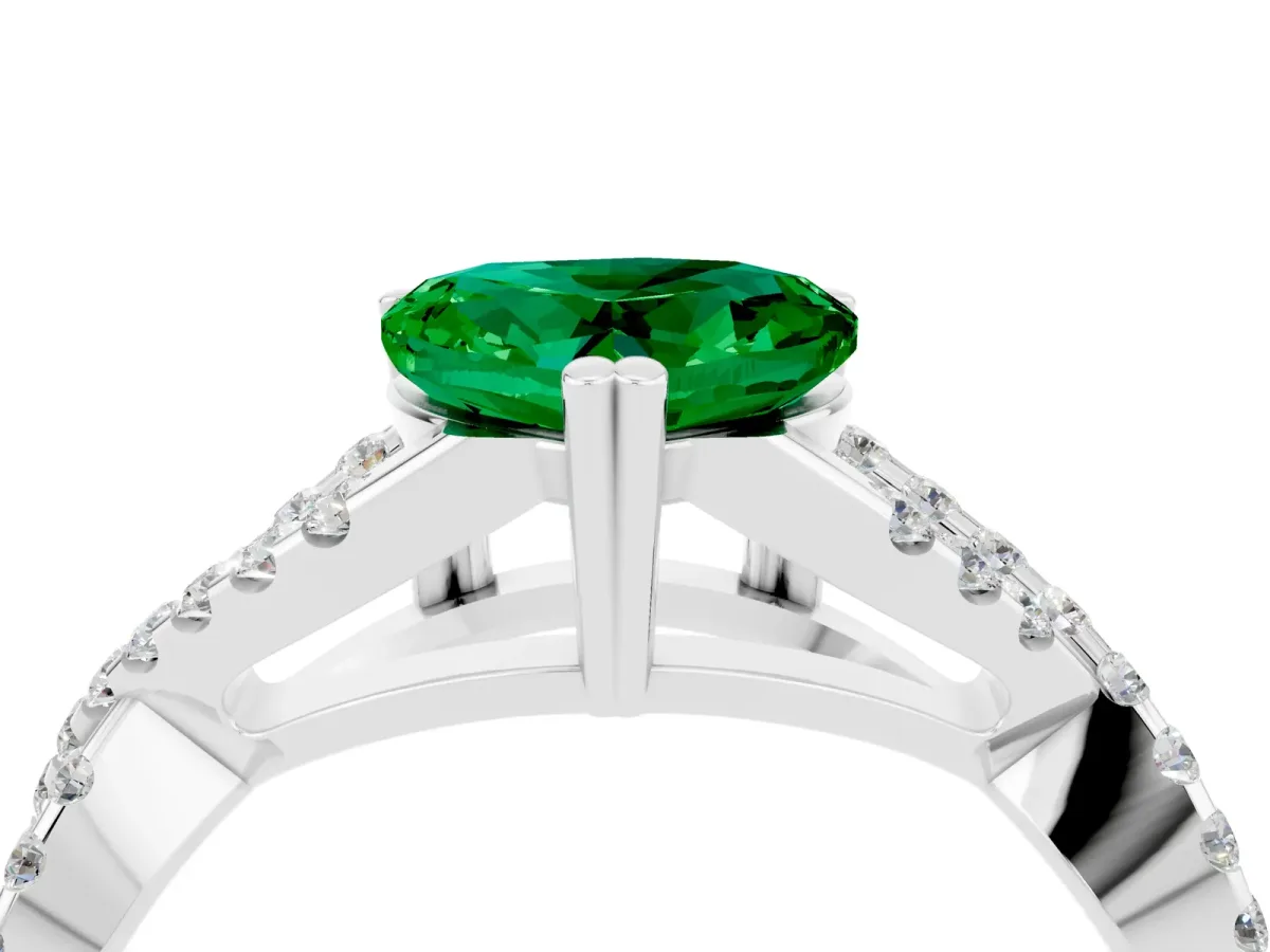 Heart Cut Emerald Solitaire Ring with Four-Prong Setting and Twisted Pavé Band Silver