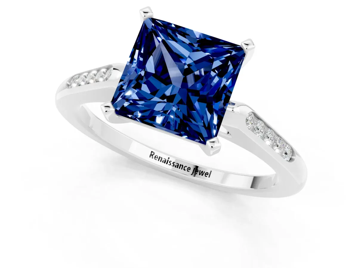 Princess Cut Blue Sapphire Solitaire Ring with Channel Set Round Band and Prong Setting Silver