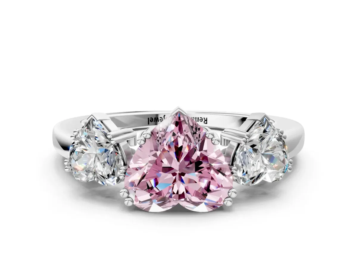 Fancy Pink Three-Stone Heart Cut Cut Diamond Ring with Channel Set Band and Four-Prong Setting Silver