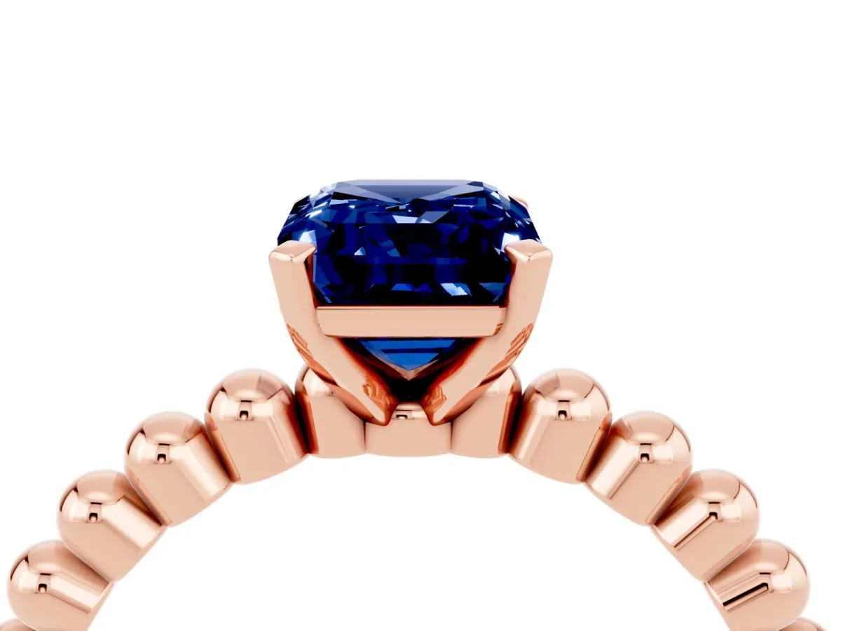 Emerald Cut Blue Sapphire Solitaire Ring with Beaded Band and Prong Setting Rose gold