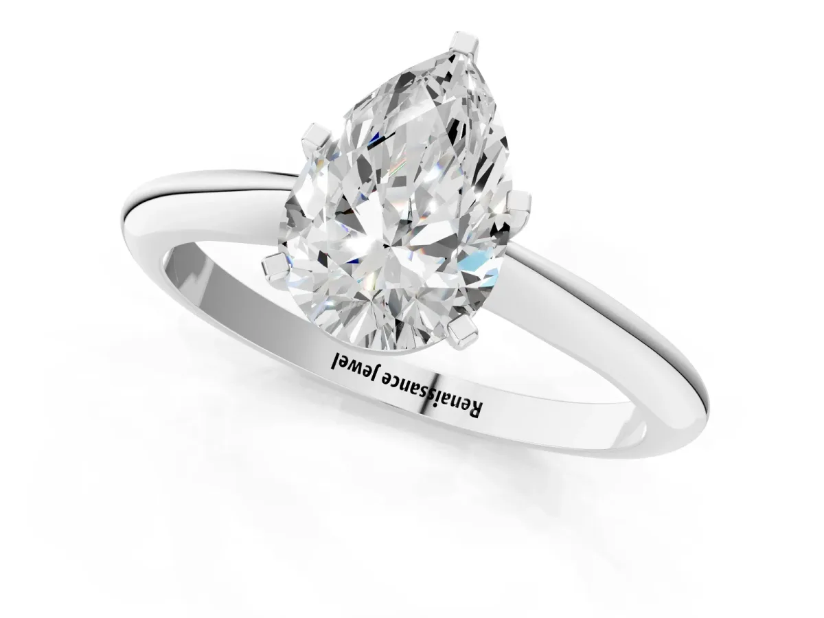Pear Cut Diamond Solitaire Engagement Ring with Classic Band and Four-Prong Setting Silver