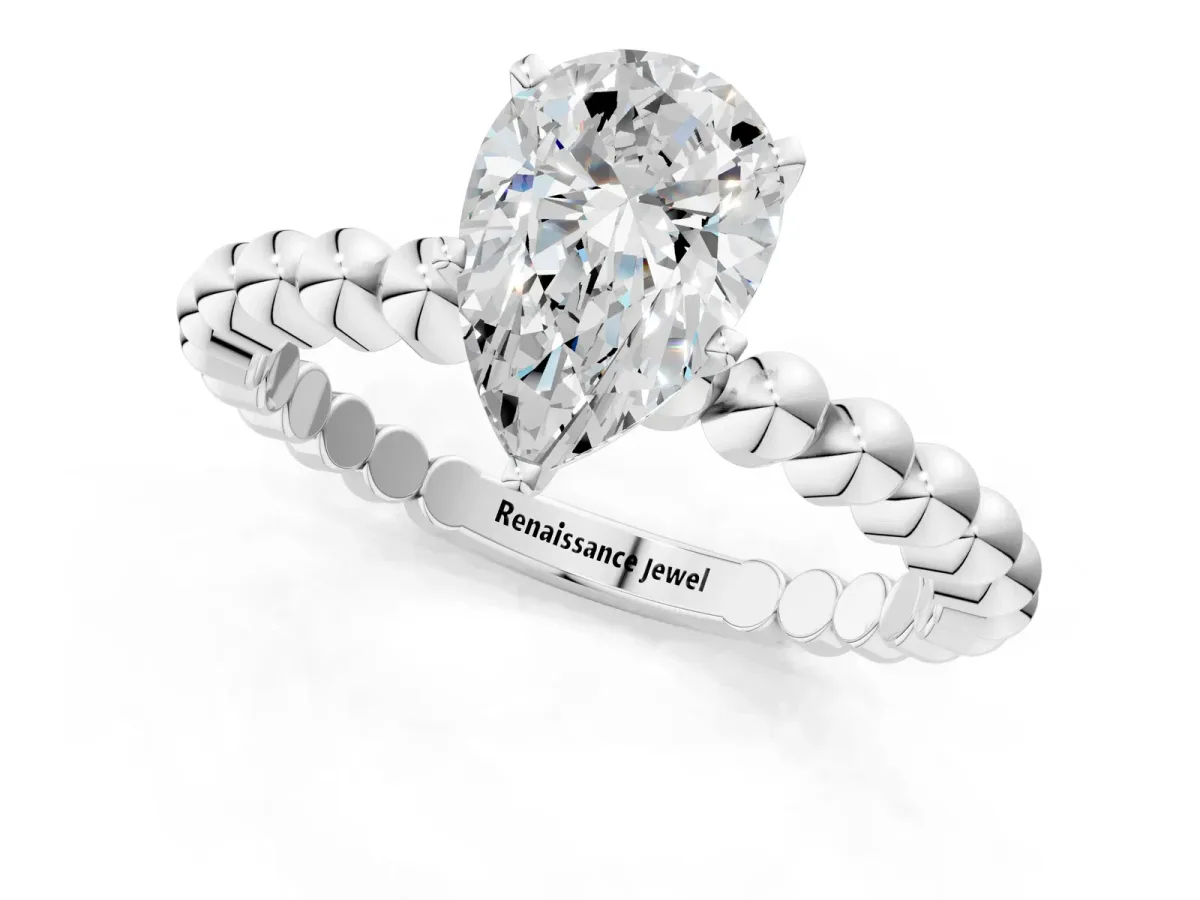 Pear Cut Diamond Solitaire Ring with Beaded Band and Prong Setting Platinum