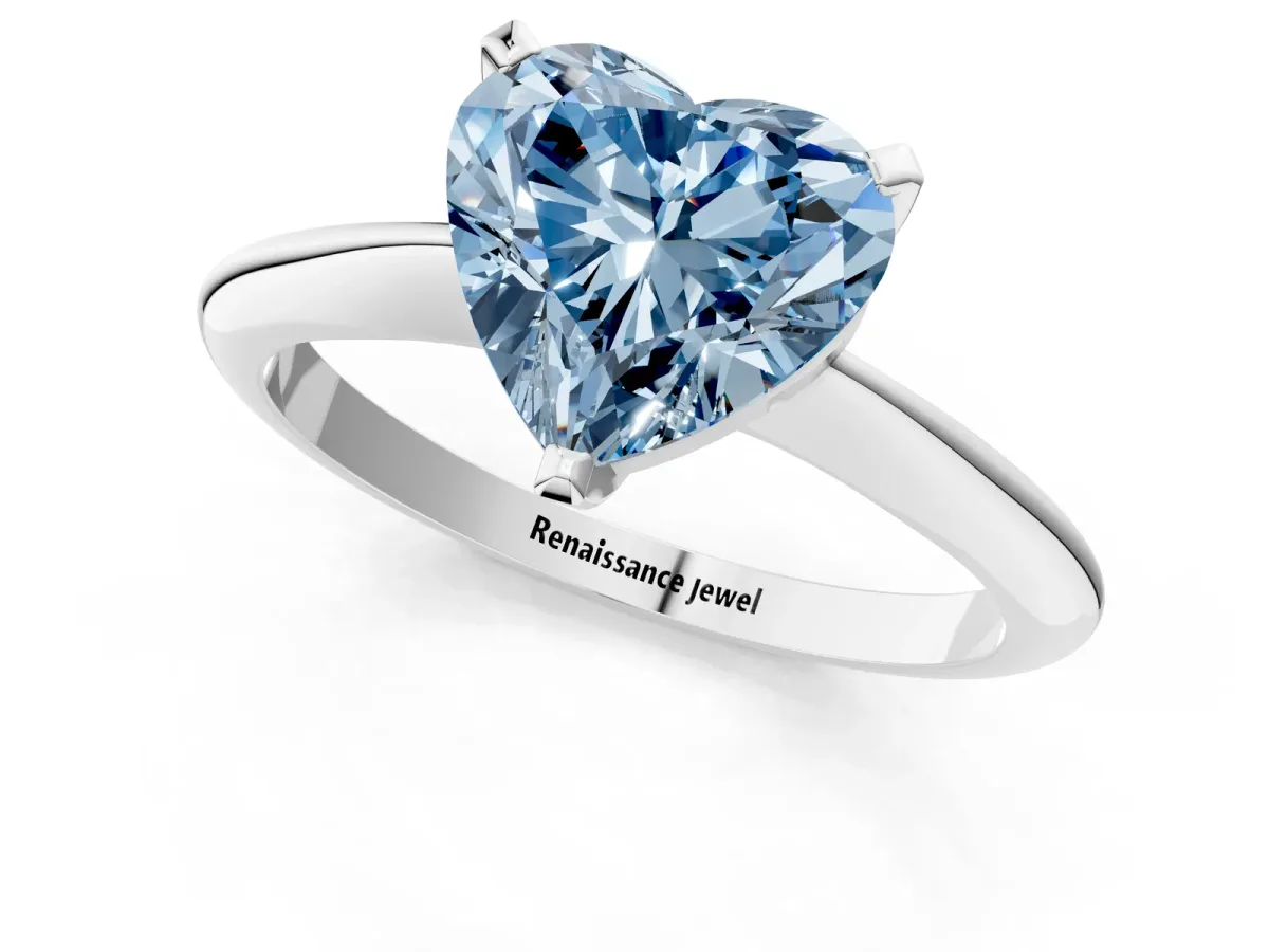 Fancy Blue Heart Cut Diamond Solitaire Engagement Ring with Classic Band and Four-Prong Setting Silver