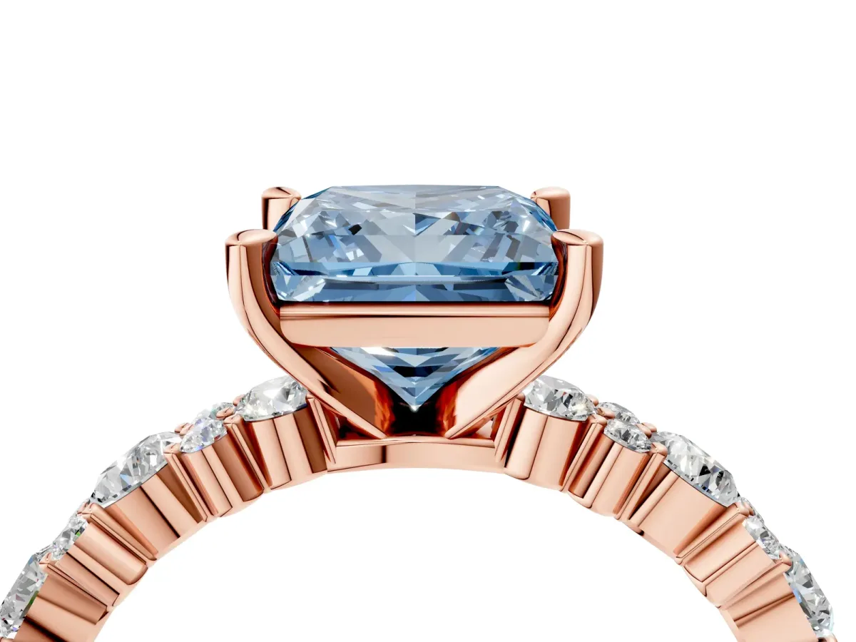 Fancy Blue Princess Cut Diamond Side Stone Solitaire Ring with Round and Four-Prong Setting Rose gold