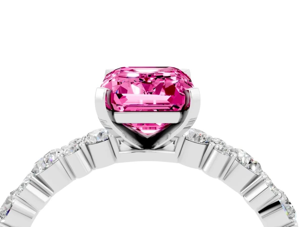 Emerald Cut Pink Sapphire Side Stone Solitaire Ring with Round and Four-Prong Setting White gold