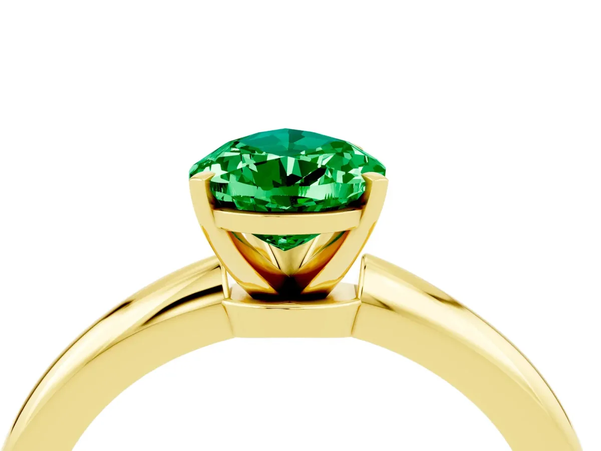 Pear Cut Emerald Solitaire Ring with Six-Prong Setting and Classic Band Yellow gold